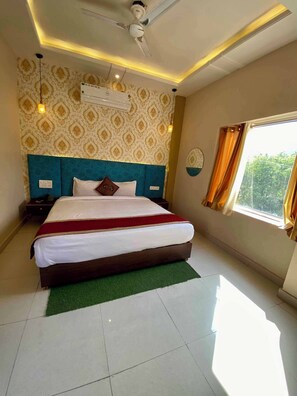 Premium bedding, down comforters, desk, soundproofing - The Indraj Palace Hotel (Amer)