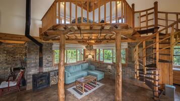 Luxury Quadruple Room, Mountain View | Living area | 43-inch flat-screen TV with cable channels