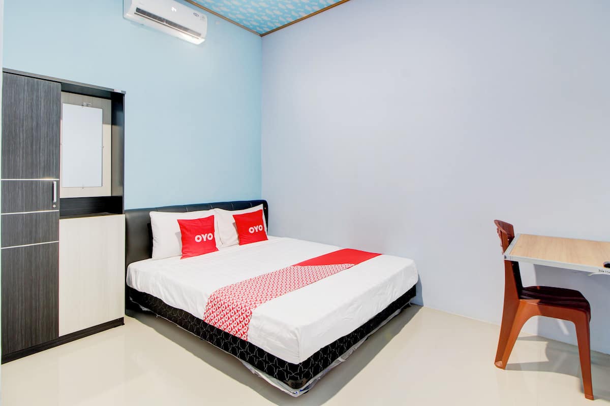 Chambre Double Deluxe | Draps en coton égyptien, literie de qualité supérieure, draps fournis