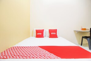 Standard Double Room - Hotel O Alun-Alun Purwokerto Near Gor Satria Purwokerto Formerly Guest House Blessing (Purwokerto)