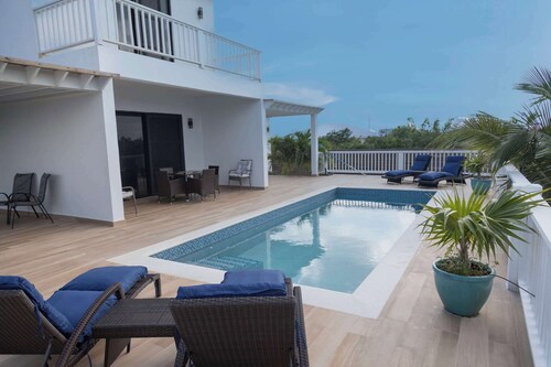 Tropical Stay Near Beach w/ Pool Access & Parking