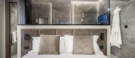 Chambre Deluxe, non-fumeur, salle de bain privée | Literie hypoallergénique, minibar contenant certains articles gratuits