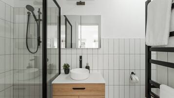 Shower, hair dryer, towels