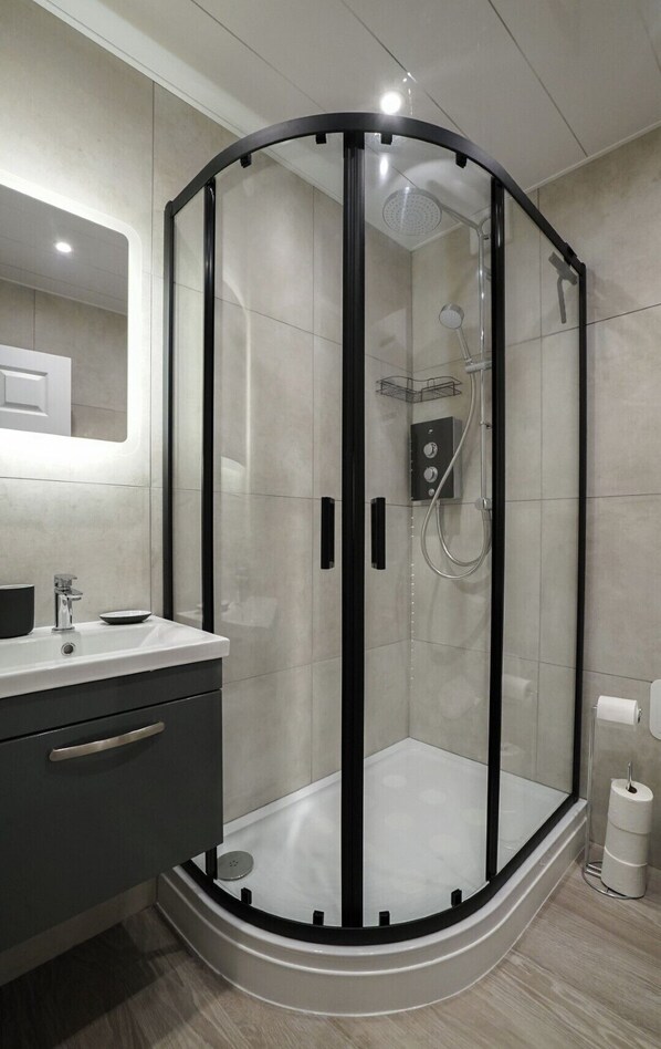 Hair dryer, towels, soap, toilet paper