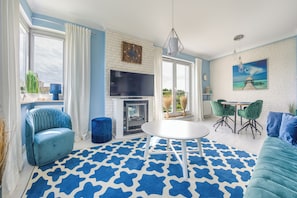 Apartamento | Área de estar | TV de tela plana