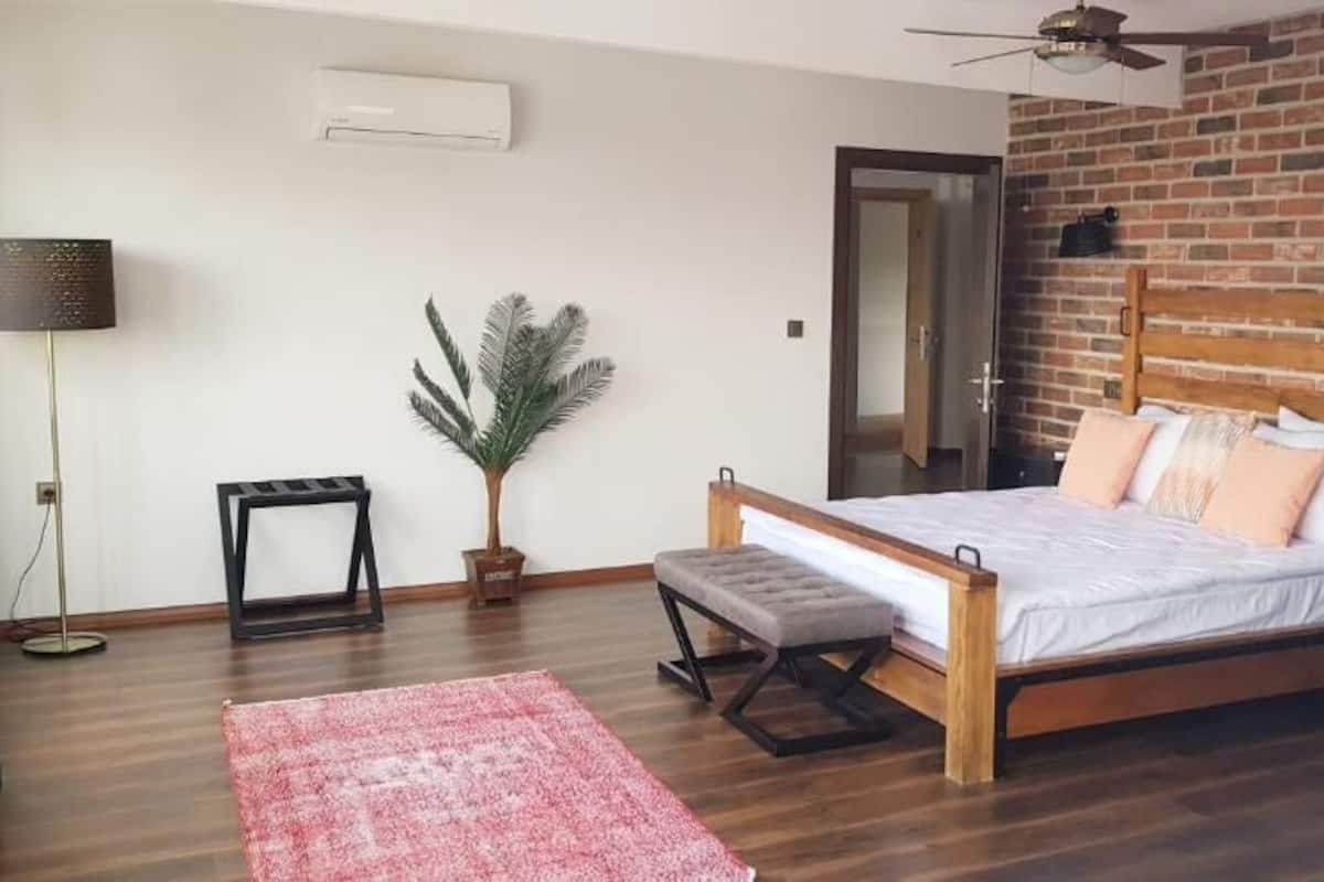 Family Twin Room, City View | Minibar, in-room safe, individually decorated, iron/ironing board