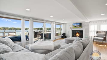 TV, fireplace, books, stereo