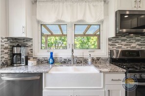 Coffee/tea maker, fridge, microwave, oven - Lakefront Retreat with Hot Tub (Trevor)