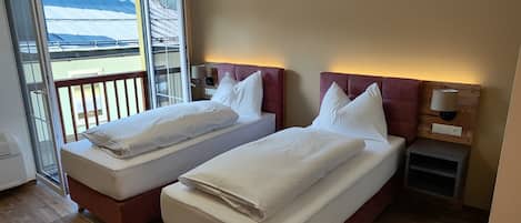 Comfort-Doppel- oder -Zweibettzimmer