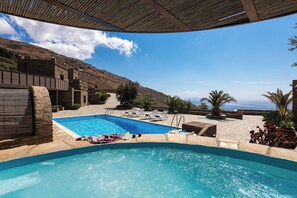 Seasonal outdoor pool, open 9:00 AM to 8:00 PM, sun loungers