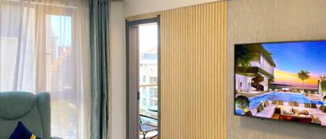 Classic Apartment | Living area | 50-inch Smart TV with cable channels, Netflix, first-run films