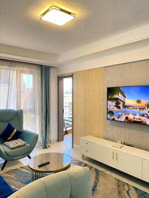 Appartement classique | Aire de séjour | Téléviseur connecté de 50 po avec télévision par câble, Netflix