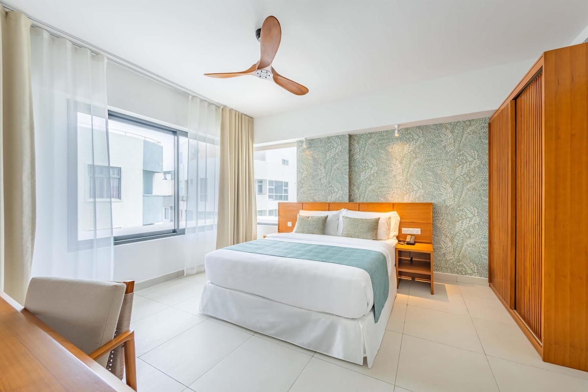 Apartment, 2 Bedrooms, City View | Premium bedding, minibar, in-room safe, desk