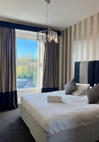 2 bedrooms, premium bedding, soundproofing, iron/ironing board