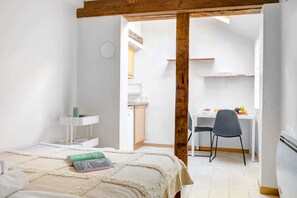 1 bedroom, desk, iron/ironing board, travel crib