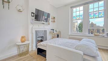 1 bedroom, desk, iron/ironing board, travel cot