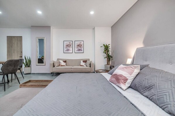 1 bedroom, desk, iron/ironing board, travel crib
