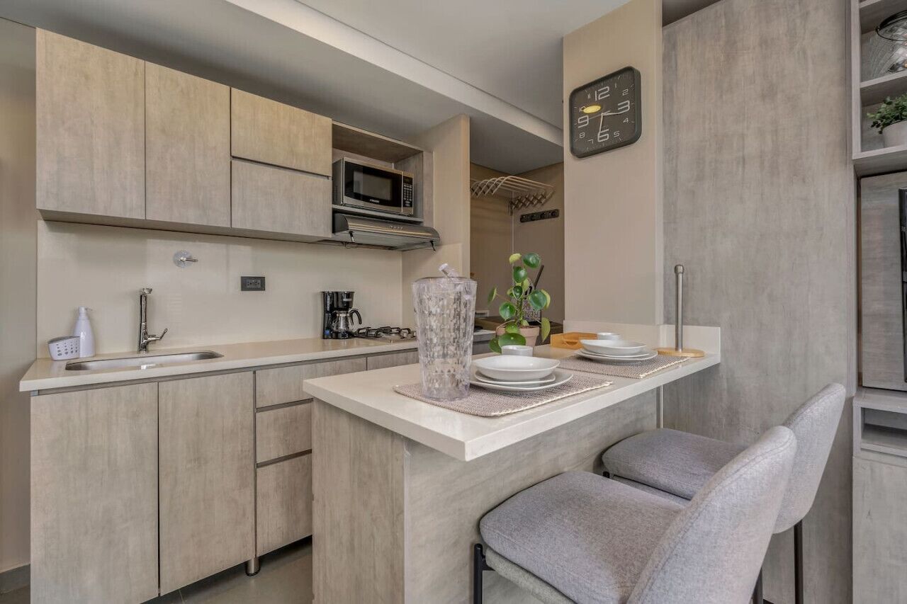 Fridge, microwave, stovetop, coffee/tea maker