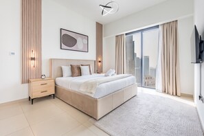 2 chambres, coffres-forts dans les chambres, fer et planche à repasser