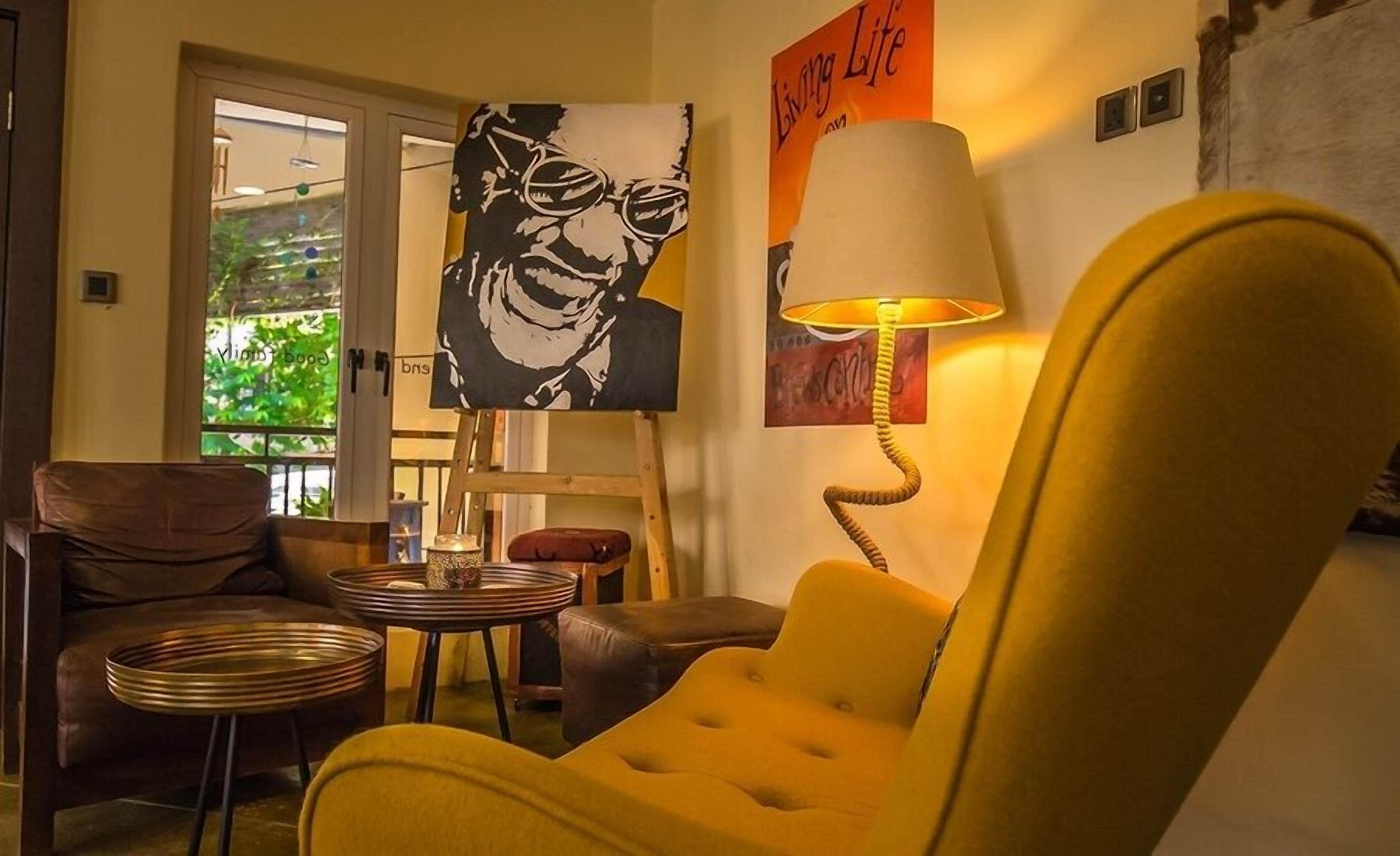 Economy Room, Balcony, City View | Living area | Flat-screen TV