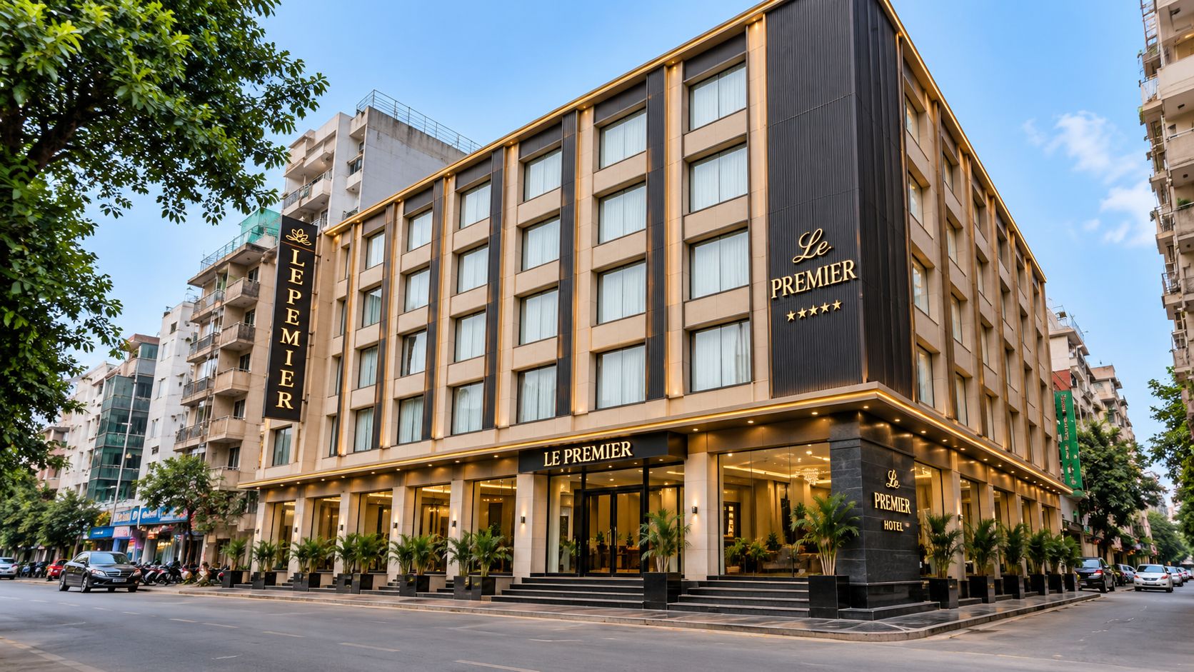 Un hotel con un llamativo letrero 'Le Premier', varios pisos y una fachada moderna.