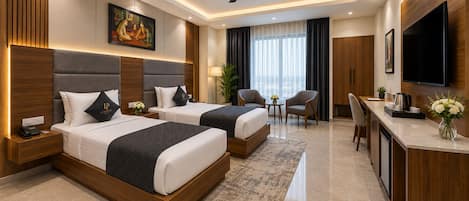 A hotel room with two beds, a desk, a chair, a TV, and an air conditioning unit.