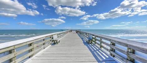 On the beach, sun-loungers