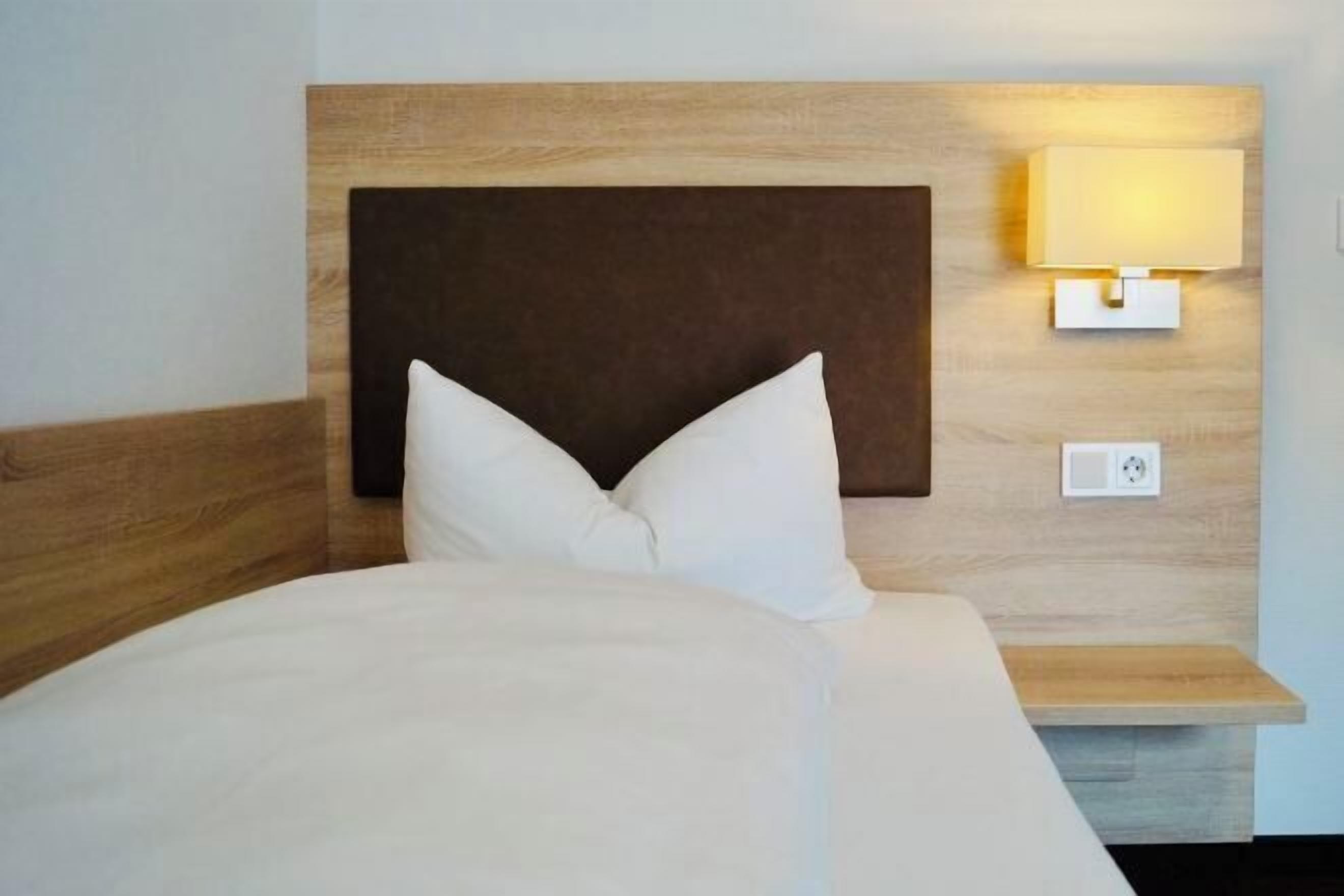 Desk, laptop workspace, free WiFi, bed sheets