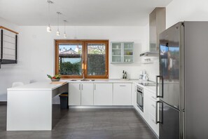 Fridge, microwave, oven, stovetop - Villa Terra Bianca - mediterenean villa with large infinity pool in the hearth of Istria (Sveti Petar U Sumi)