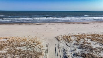 On the beach, sun loungers, beach towels