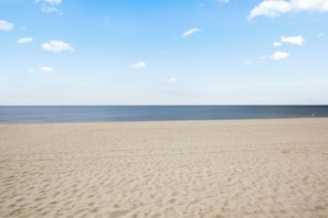 On the beach, sun loungers, beach towels - Serenity Now: Your Tranquil Escape Awaits. 2 POOLS! Walk to the Beach! (Gulfport)