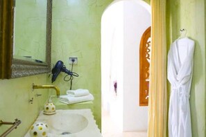 Hair dryer, towels, soap, shampoo