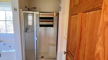 Shower, towels, soap, toilet paper