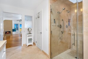 Jetted tub, eco-friendly toiletries, hair dryer, towels