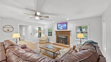 Smart TV, fireplace, books