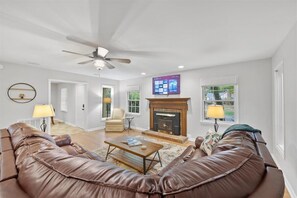 Smart TV, fireplace, books