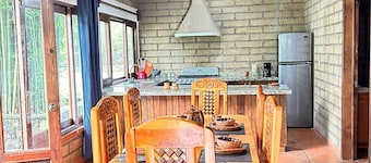 Super comfortable cabin with pool, surrounded by nature, close to downtown.