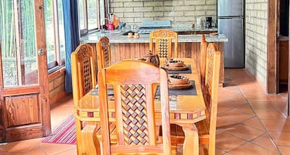 Super comfortable cabin with pool, surrounded by nature, close to downtown.