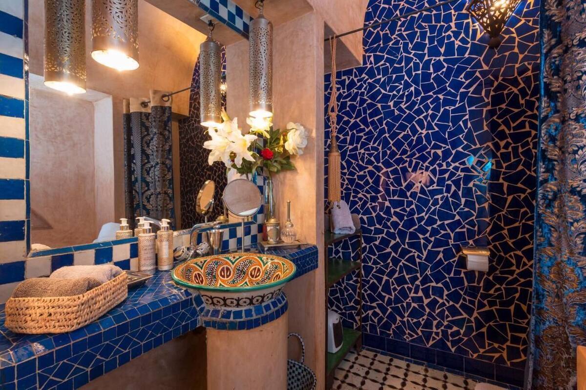 Designer toiletries, hair dryer, towels
