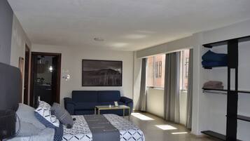 Family Apartment, City View | Iron/ironing board, free WiFi