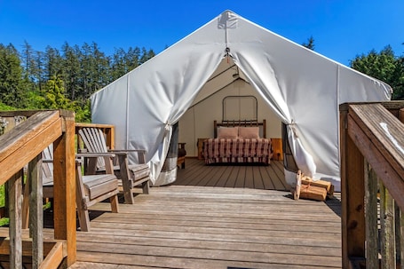 Terrace/patio. Glamping Tent 2 min walk to west-facing beach at popular resort
