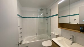 Shower, hair dryer, towels