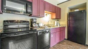 Fridge, microwave, oven, stovetop - Experience Year-Round Family Fun at Christmas Mountain Village – 2 Bedroom Villa (Wisconsin Dells)