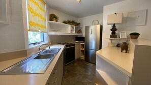Fridge, microwave, oven, coffee/tea maker