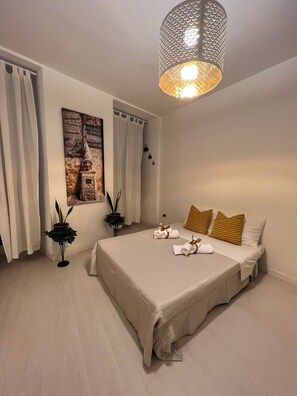 1 habitación, tabla de planchar con plancha, wifi gratis y ropa de cama 