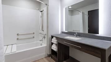 Combined shower/tub, hair dryer, towels, soap