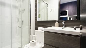 Studio (324) | Bathroom | Shower, hair dryer, towels, soap