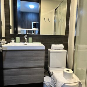 Premium Double Room, 1 Double Bed, Air conditioning | Bathroom | Shower, hair dryer, towels, soap