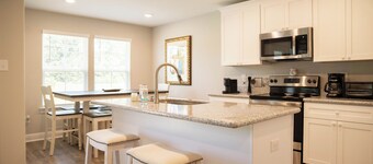 Water view close to beach & downtown Ocean Springs! The 15th Fairway Cottage