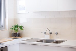 Microwave, oven, cookware/dishes/utensils, dining tables